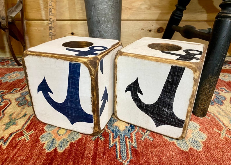 Two Coastal Anchor Tissue Box Covers displayed together, hand-painted with nautical anchor designs, perfect for beach cottages, coastal vacation homes, seaside cabins, or short-term rental interiors, rustic hand-crafted tissue box covers