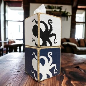 Collection of handcrafted octopus tissue box covers showcasing coastal nautical style, vintage distressed finishes, and beach house decor perfect for bathrooms, powder rooms, cottages, lake homes, and waterfront retreats