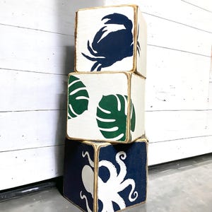 Group on coastal tissue boxes including octopus tissue featuring ocean-inspired artwork, weathered coastal finishes, and nautical charm for beach houses, coastal homes, vacation rentals, and seaside bathrooms