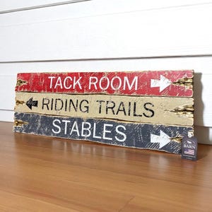 Western Tack Room Equestrian Sign Set displayed together, hand-distressed wood wall décor for barns, ranch homes, cabins, vacation rentals, and lodge-style interiors. Showcases authentic horse riding and tack room charm, ideal for Western décor enthusiasts, horse lovers, and equestrian-inspired spaces