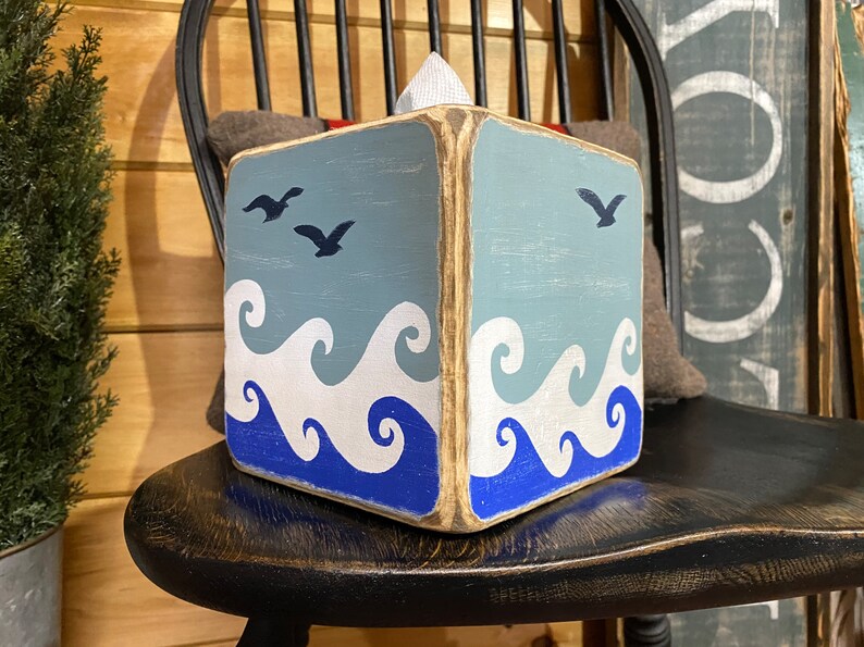 Coastal waves tissue box cover with distressed wood finish inspired by ocean tides and sandy beaches, beach house and ocean-inspired decor perfect for coastal cottages, lake houses, vacation rentals, and relaxed seaside bathrooms, rustic beach style