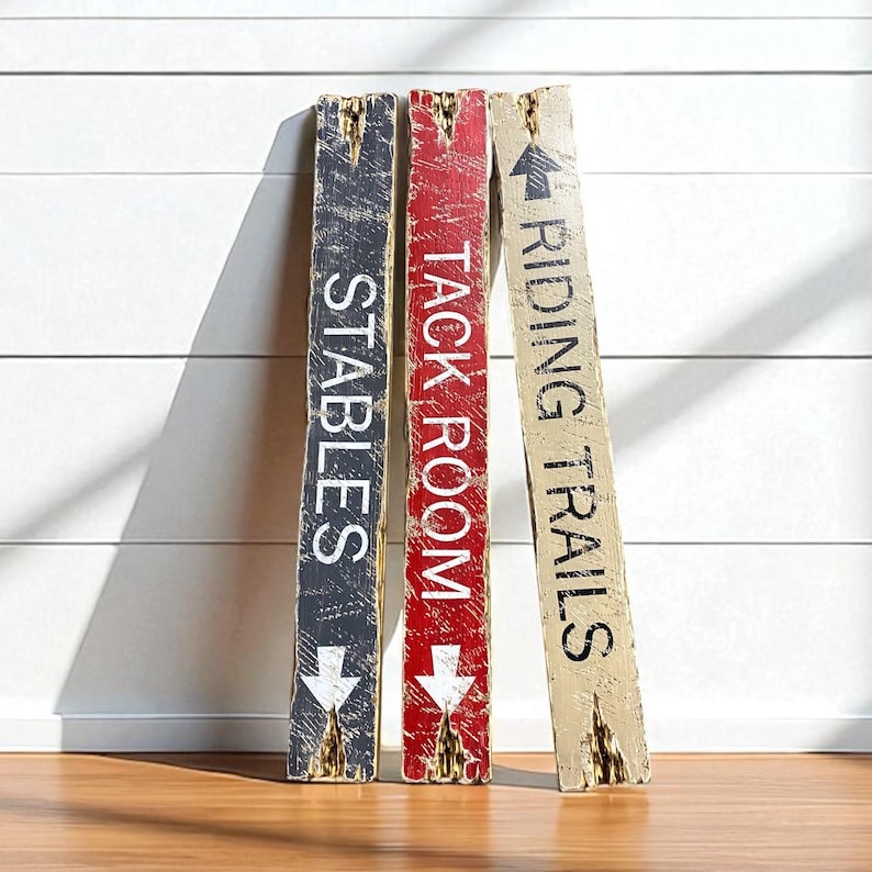 Group display of the Tack Room Sign Set in a barn, ranch home, or rustic cabin, highlighting all three hand-distressed signs. Perfect for tack rooms, stables, riding trails, vacation rentals, cabins, and lodge interiors, emphasizing Western character, authentic handcrafted style, and horse-themed décor