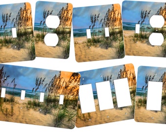 This beach switch plate cover features a gorgeous view of the sand, sea grasses and ocean sunset. SS204