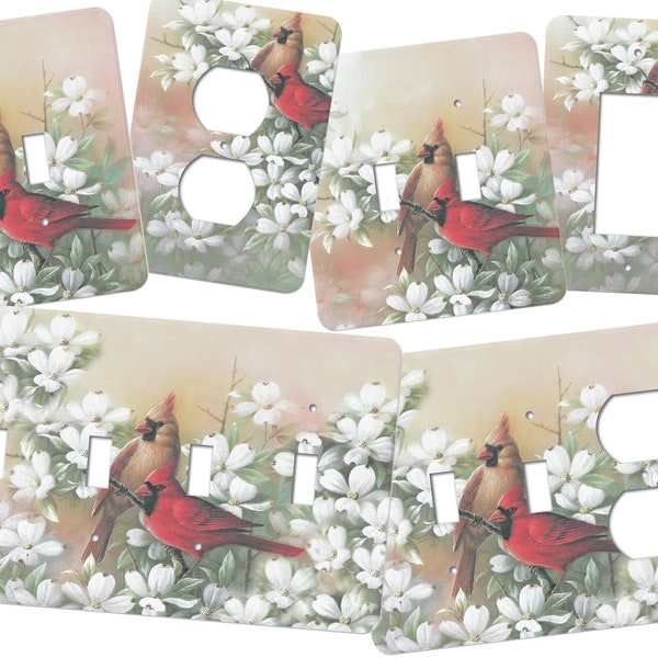 This light switch plate features a male and female cardinal in a dogwood tree.  One of our top selling bird switchplate covers. AB10