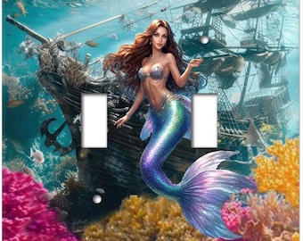 Mermaid Switch Plates depict the fantasy images of gorgeous mermaids.  Mermaids  have been depicted in art for hundreds of years. FY54