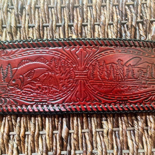 A NICE FLEECE LINED LEATHER FLY FISHING WALLET + ARTIFICIAL SALMON