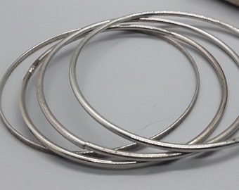 4 pulseras vintage de color plata