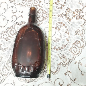 Vintage amber glass liquor bottle