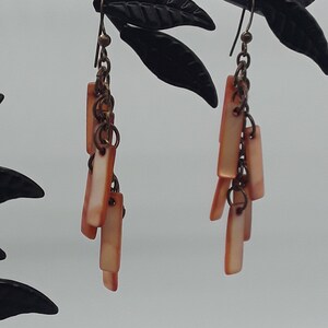 Vintage seashell dangle earrings pink