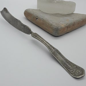 Antique WM A ROGERS silver/nickel butter knife