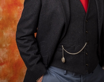 May include: A dark gray suit jacket with a vest and a red tie. The jacket has a pocket watch chain attached to the bottom button.
