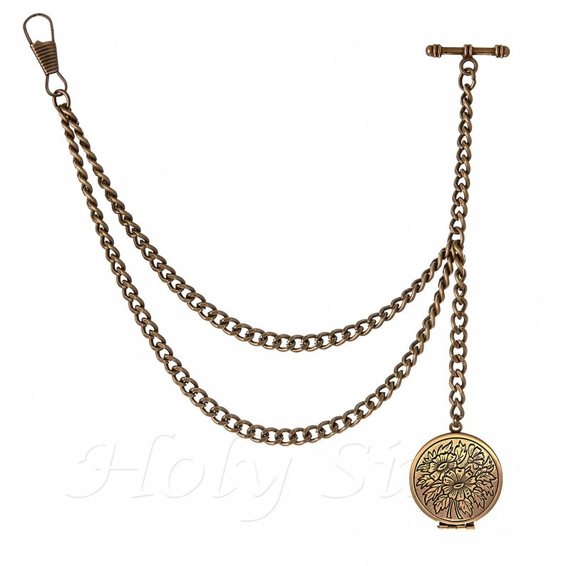 A gold pocket watch chain and a black case