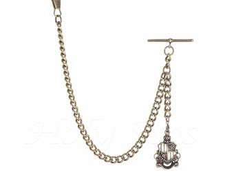 May include: A gold-toned pocket watch chain with a decorative shield-shaped charm. The chain has a swivel clasp and a T-bar connector.