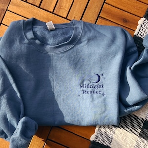 Midnight reader embroidered crewneck