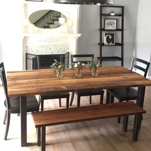 Pictured in Reclaimed Oak/ Textured & Blackened Metal. <a href="https://wwmake.com/products/reclaimed-wood-dining-chairs-barnwood-dining-chairs"> Farmhouse Dining Chair</a>