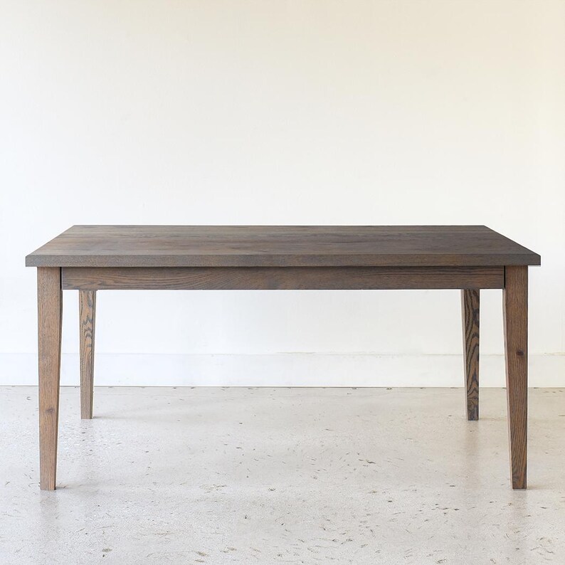 Slim Tapered Leg Dining Table Pictured In White Oak Gray