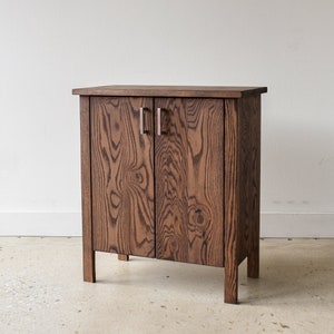 Two-Door Wood Storage Cabinet image 1