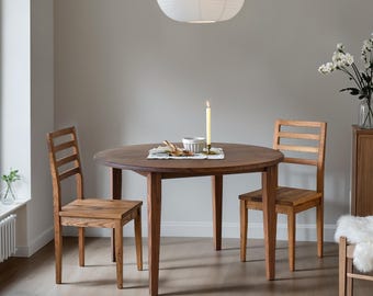 Round Tapered Leg Dining Table