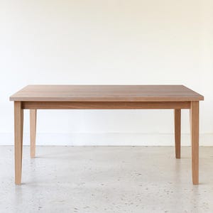 Slim Tapered Leg Dining Table Pictured In White Oak Natural