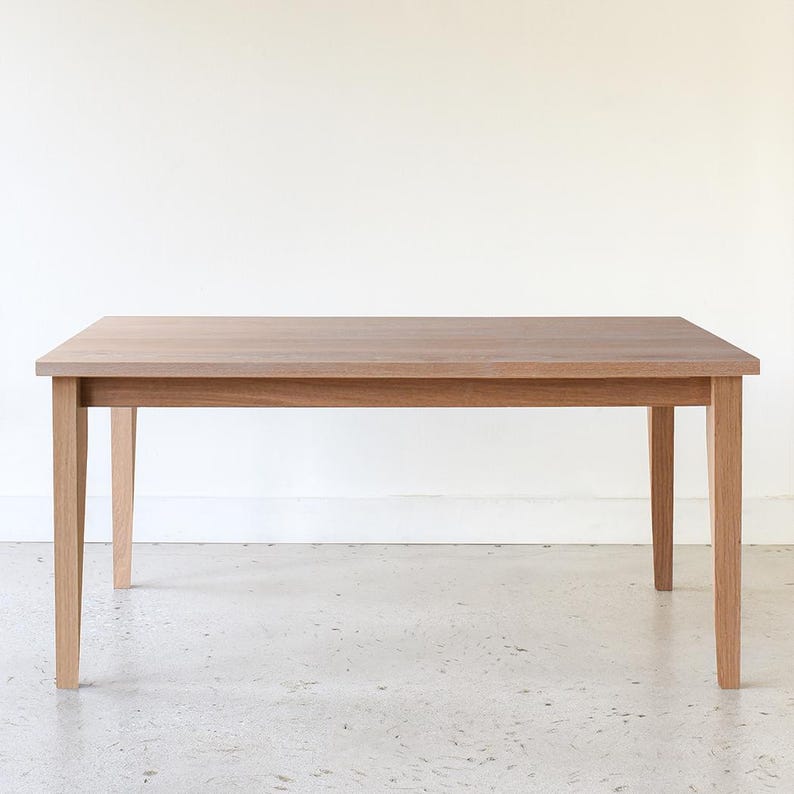 Slim Tapered Leg Dining Table Pictured In White Oak Natural