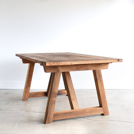 Wood trestle 2024 coffee table
