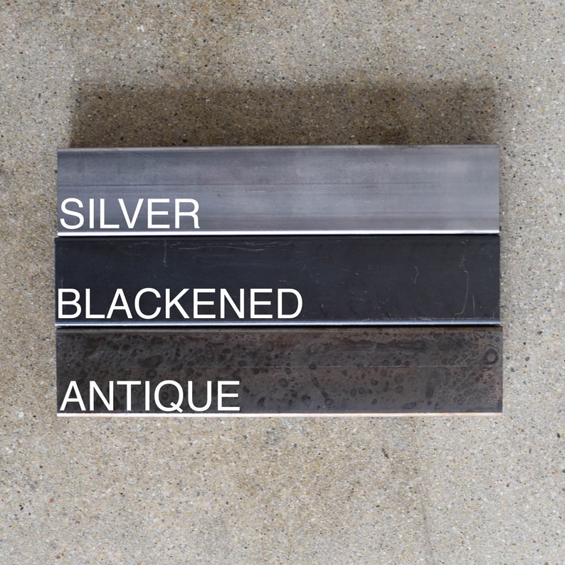 May include: Three metal samples in different finishes: silver, blackened, and antique. The samples are arranged vertically with the silver sample at the top and the antique sample at the bottom.