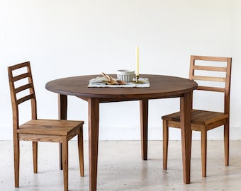 Round Tapered Leg Dining Table