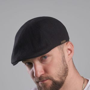 RUSTY gorra con pico de pato de verano de lino puro NEGRA