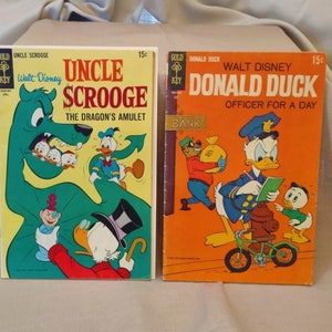 2 Vintage 1960&#39;s Gold Key Walt Disney Comic Books - No. 74 Uncle Scrooge The Dragon&#39;s Amulet - No. 126 Donald Duck Officer for a Day
