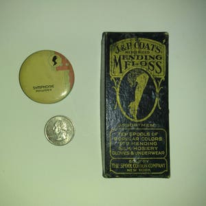 May include: A black box with gold lettering that reads "J&P Coats Mercerized Mending Floss Assortment Ten Spools of Popular Colors for Mending Silk Hosiery Gloves & Underwear Sold by The Spool Cotton Company New York".