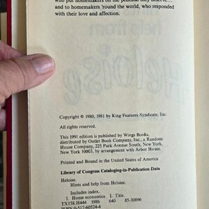 May include: Open book page with text dedicated to mothers and homemakers. Copyright information from 1980 and 1981 by King Features Syndicate, Inc. is visible. The book is a 1991 edition published by Wings Books.