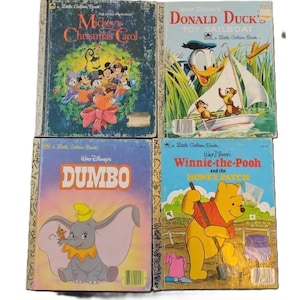 May include: Four vintage Little Golden Books featuring classic Disney characters. The books are Mickey's Christmas Carol, Donald Duck's Toy Sailboat, Dumbo, and Winnie-the-Pooh and the Honey Pot.