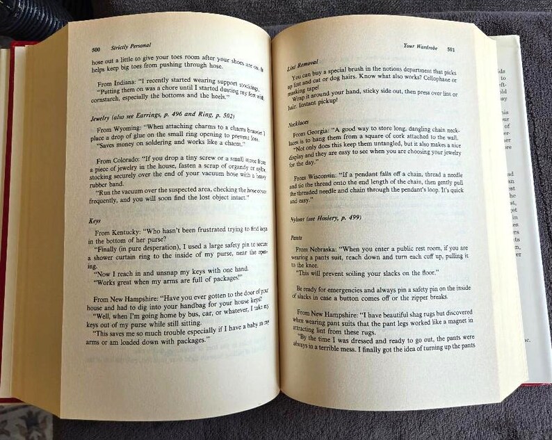 May include: Open book with text on aged paper. The pages are from a book titled "Strictly Personal" and "Your Wardrobe". The text includes tips on jewelry, keys, and lint removal.
