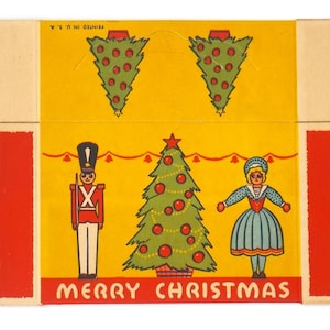 May include: A vintage Christmas box with a yellow background and red accents. The box features a toy soldier, a Christmas tree, and a doll. The text "Merry Christmas" is printed on the front of the box.