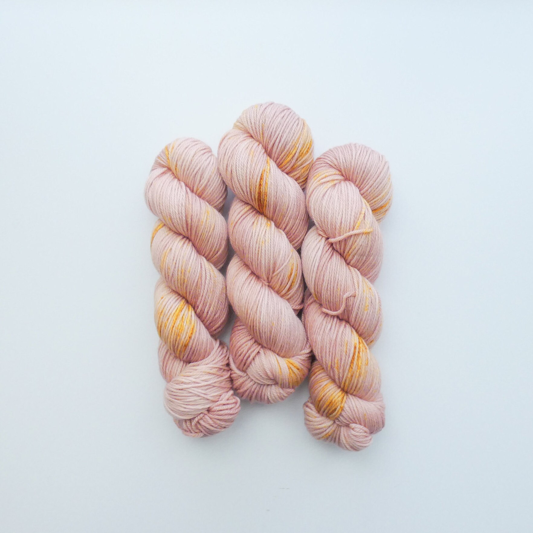 Rose Gold Hand Dyed DK Merino Yarn