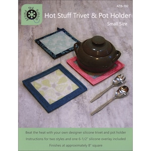 May include: A collection of handmade trivets and pot holders in various colors and patterns. One trivet is topped with a brown pot. The trivets are approximately 8 inches square. The image also includes two silver spoons.