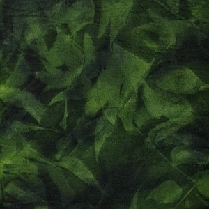 May include: Dark green abstract pattern with overlapping leaf shapes. The image features varying shades of green, creating a textured, layered effect. The design evokes a natural, organic theme, suitable for fabric or wallpaper.