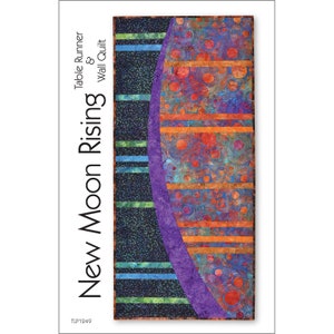 May include: A rectangular quilt with the text "New Moon Rising Table Runner & Wall Quilt." The quilt features a dark blue background with green and blue stripes, a purple curved section, and a colorful patterned design with orange and blue circles.