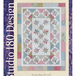 May include: A quilt pattern titled "Sugar & Spice" by Deb Tucker. The quilt design features star patterns in red, blue, and green on a white background. The project size is 45" x 62".