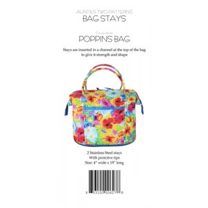 May include: A floral-patterned Poppins bag with blue accents and handles. The bag features a vibrant mix of red, yellow, and blue flowers. The image also includes text that reads "BAG STAYS" and "POPPINS BAG". The bag measures 4 inches wide by 19 inches long.
