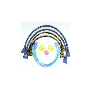 May include: A whimsical arrangement of fabric bag handles in various patterns, including blue batik and zebra print, arranged in an arc. Two yellow buttons and a pink button form a face.