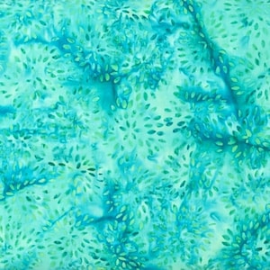 May include: A fabric with a watercolor-like design in shades of teal, turquoise, and light green. The pattern features clusters of small, leaf-like shapes arranged in a radial pattern, creating a textured, organic look. The fabric has a soft, blended appearance.
