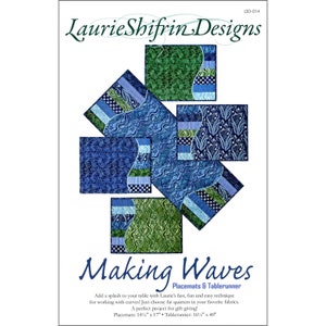 May include: A product image featuring a quilt pattern with the text "Laurie Shifrin Designs" and "Making Waves." The design includes blue and green fabric squares with wave-like patterns. Placemats are 14.5" x 17" and the tablerunner is 16.5" x 40".