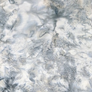 May include: Abstract fabric with a marbled design in shades of gray and white. The fabric has a textured appearance, with areas of dense, speckled patterns and flowing, cloud-like formations. The overall effect is reminiscent of stone or water.