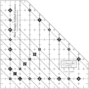 May include: A clear quilting ruler with black markings and the text "Mini Simple Folded Corners". The ruler features diagonal lines, numbers, and diamond shapes for precise fabric cutting. Includes the signature of Doug Leko and copyright information.