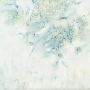 May include: A fabric with a watercolor effect. The design features a blend of white, light blue, and pale yellow hues. The pattern has a soft, flowing appearance, with subtle variations in color and texture, creating a dreamy, ethereal aesthetic.