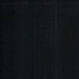 May include: Solid black background with subtle vertical lines. The image is a simple, dark composition, with a focus on texture and shadow. The overall effect is minimalist and abstract.