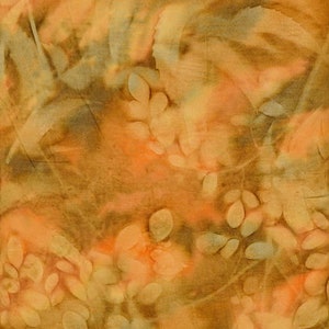 May include: Textile artwork in warm tones. The design incorporates orange, brown, and beige, with leaf-like patterns and organic shapes. The fabric appears textured, possibly made from natural fibres. The overall effect is of a natural, earthy aesthetic.