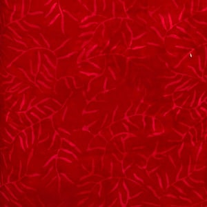May include: A vibrant red fabric with a repeating pattern of stylized, light red leaf-like shapes. The design creates a textured appearance, suitable for various crafting and sewing projects. The overall color is a deep, rich red.