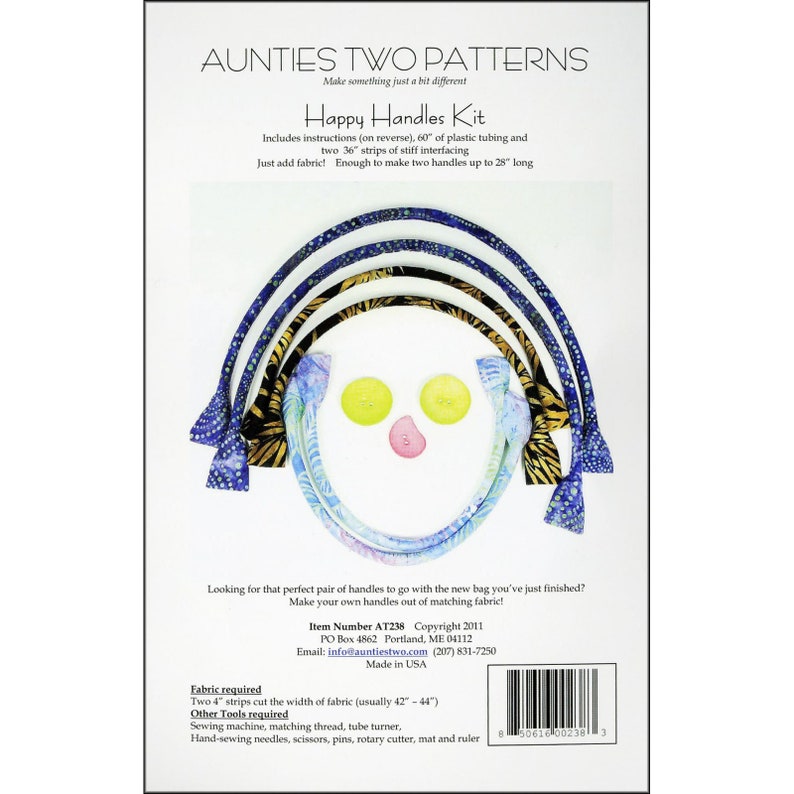 May include: Happy Handles Kit by Aunties Two Patterns. The kit includes instructions, plastic tubing, and interfacing to create two handles up to 28 inches long. The handles feature colorful fabric patterns, with yellow and pink buttons. The text on the packaging reads "Happy Handles Kit".